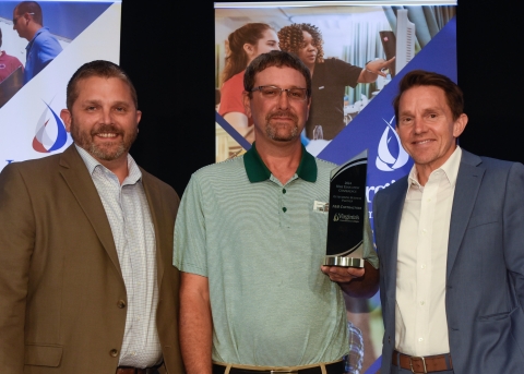 Jason Ferguson with Dustin Falls receiving award