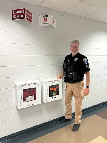 Mike Hamilton with AED box