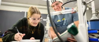 Two students in chemistry class