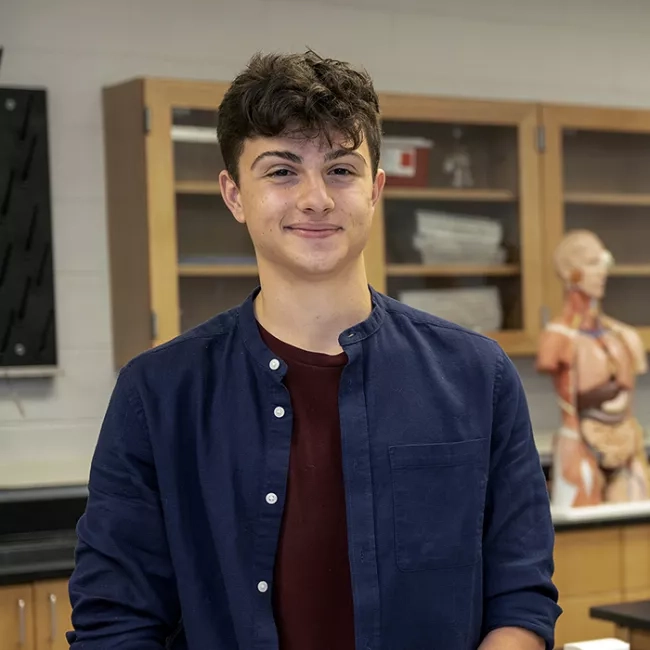 Male student in science lab